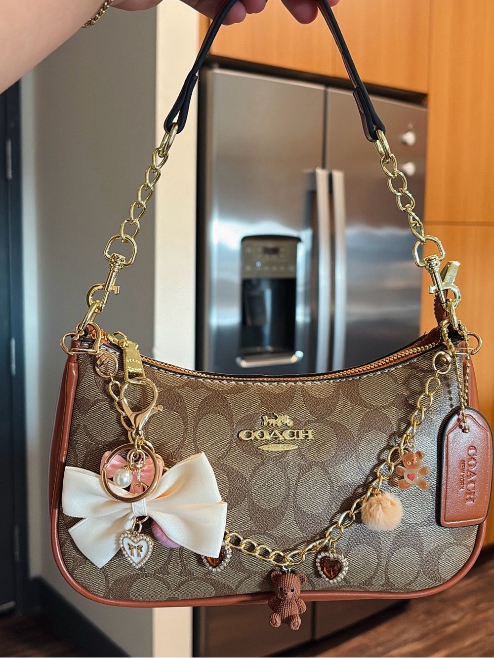 COACH Brown Signature Canvas Shoulder Bag with Gold Chain Accents